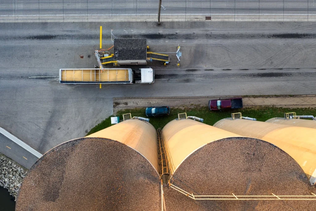 pexels-photo-10600136 Aerial view of industrial silos next to a truck at a grain facility in Red Wing, Minnesota.