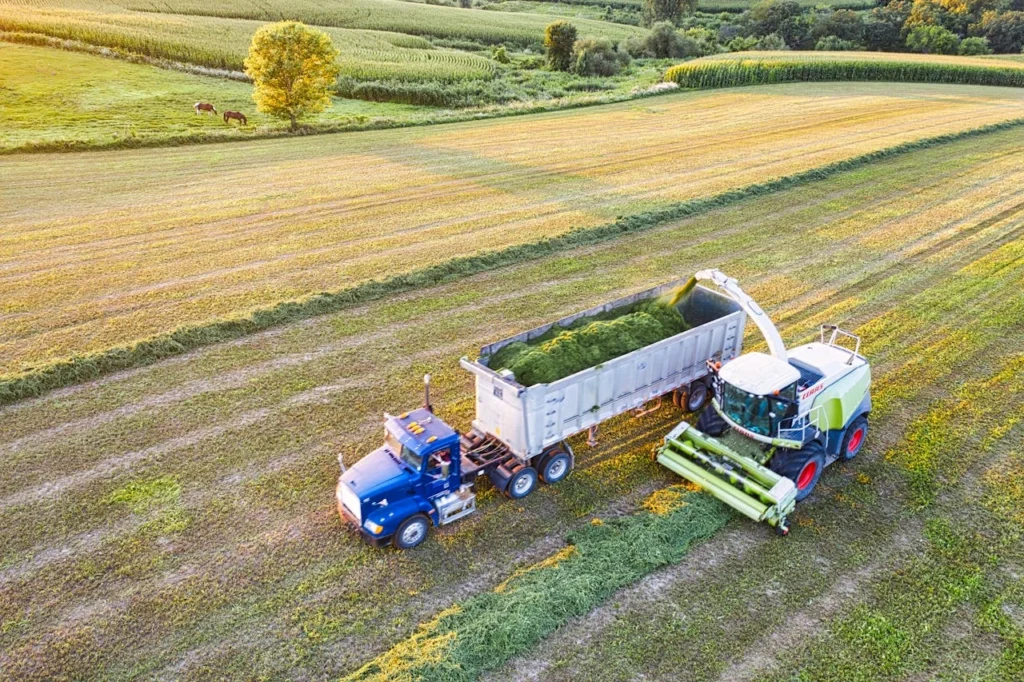 pexels-photo-9796843 Aerial view of a tractor and harvester in a field during harvest in rural Minnesota.